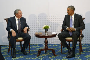 The leaders posed briefly to reporters before meeting privately. Seated on a couch and separated by a small table, have shaken hands. 