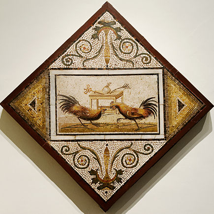 In this ancient Roman mosaic, two cocks face off in front of a table displaying the purse for the winner between a caduceus and a palm of victory (National Archaeological Museum of Naples)