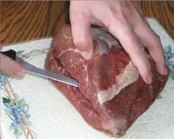 Cut a slit in the meat.