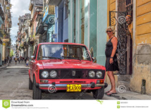 august-cuba-havana-pimped-restored-russian-lada-streets-colourful-pink-street-showing-colourful-colonial-architecture-62333321