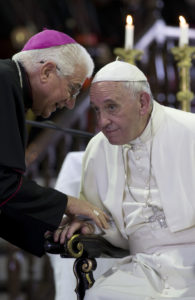 Pope Francis listens to Archbishop of Santiago de Cuba Dionisio Guillermo García Ibañez . (Ismael Francisco/Cubadebate via AP)