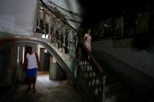 People are seen at the entrance staircase and hall of a building in Havana, Cuba May 28, 2017. Picture taken May 28, 2017. REUTERS/Stringer