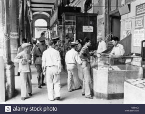 1930s-1940s-men-at-local-lottery-shops-havana-cuba-H3W1XA