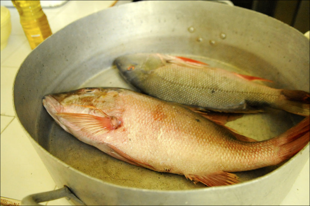 Fresh fish sit in a pan, awaiting preparation for a July 2017 Shabbat dinner at Comunidad Hebrea Tiferet Israel in Camagüey. (Larry Luxner/Times of Israel)