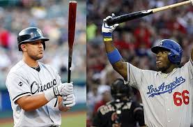 Yasiel Puig y José Abreu. 