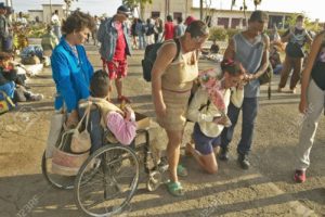 20605305-people-crawling-in-religious-ceremony-at-san-lazaro-catholic-church-in-el-rincon-cuba-site-of-annual