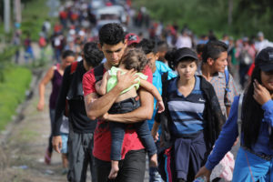 honduran-migrants-turn-around