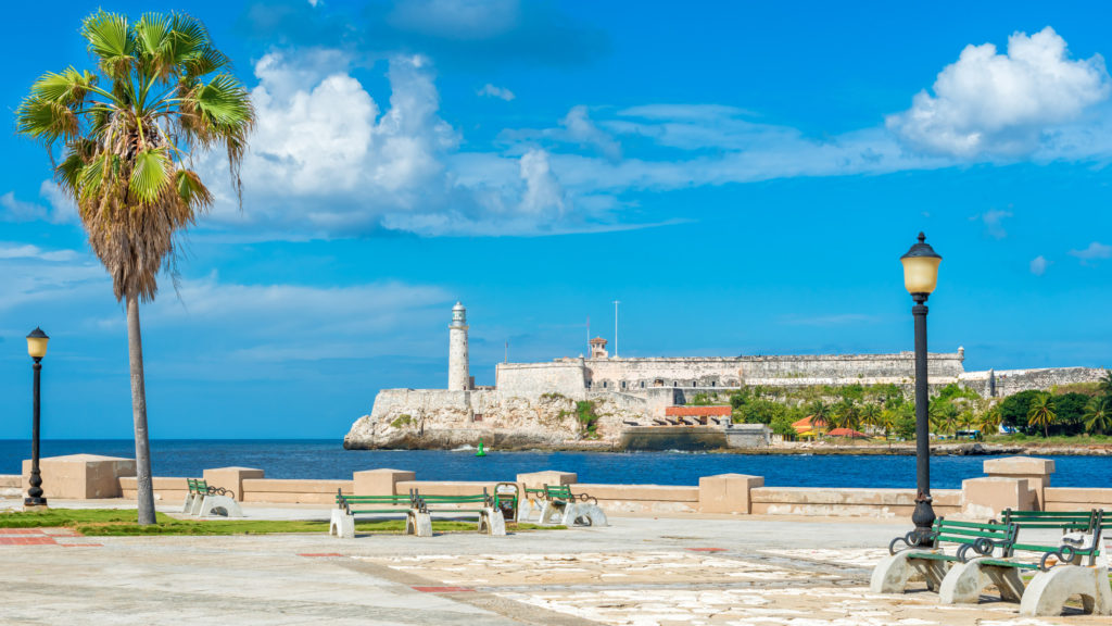 Romantic park in Havana with a view of the castle of El Morro