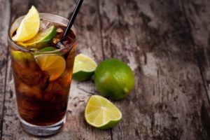 cuba-libre-drink-placed-on-rustic-table-royalty-free-image-1581775698